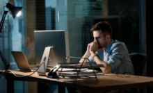 Workaholic man working late
